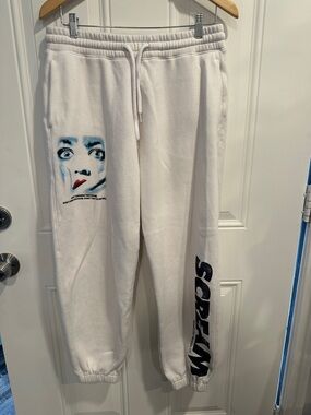 Men’s Hollister scream Ghostface cream colored sweatpants
